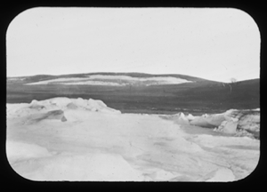 Image of Snowy foreground, tundra beyond